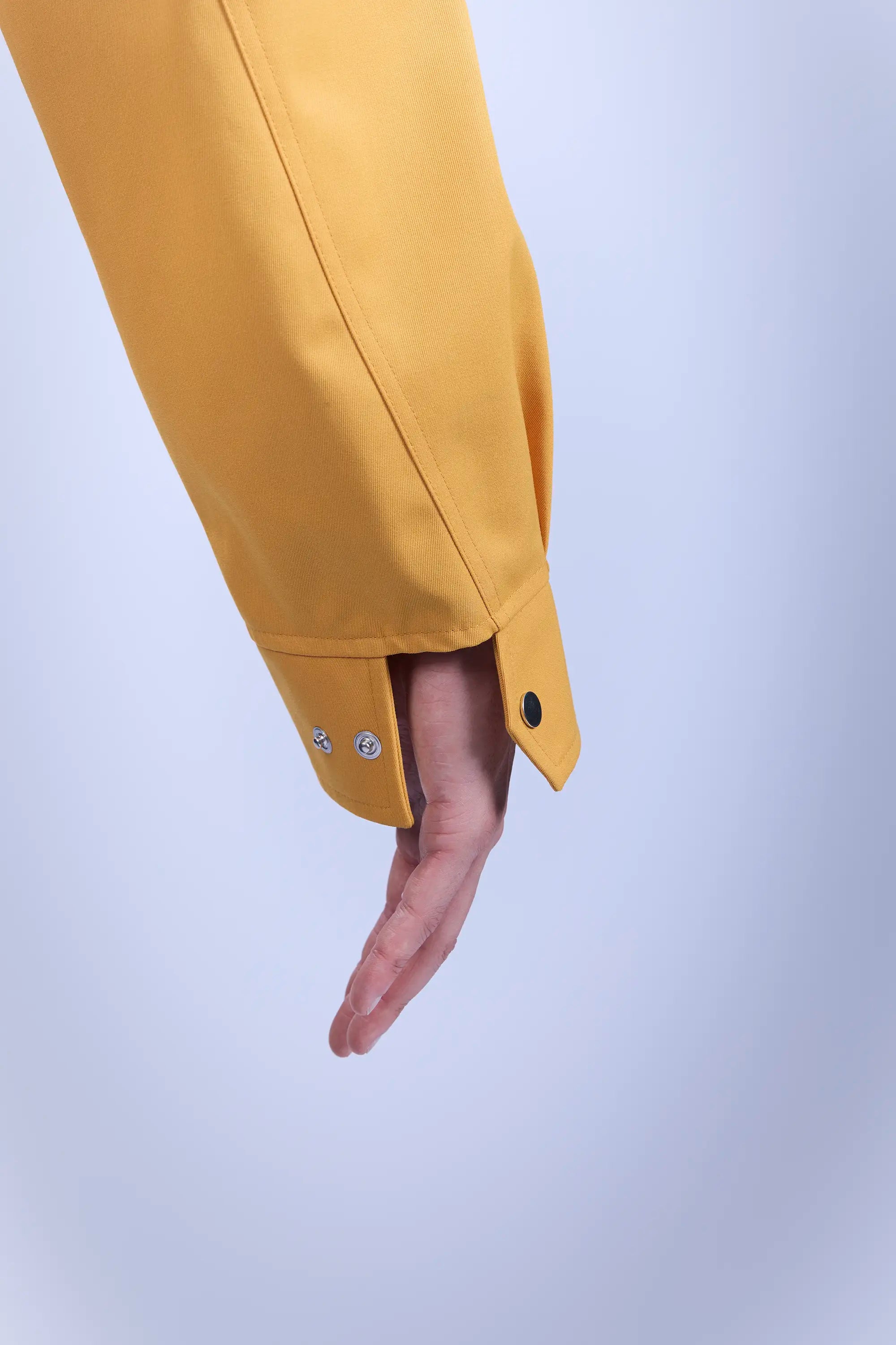 3-step adjustable cuffs via YKK DUP6 snap buttons