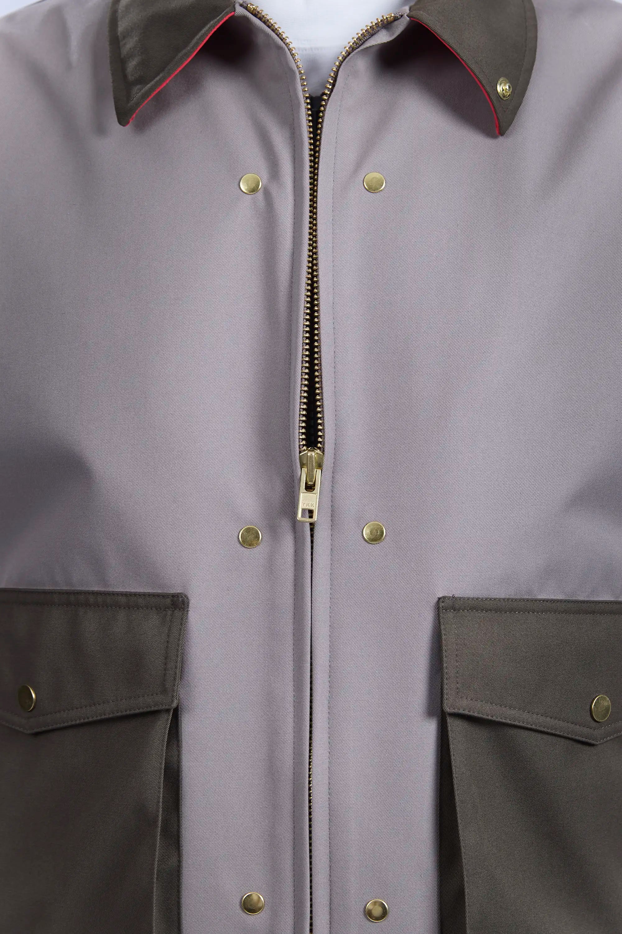 Detail view of YKK size 8 metal zipper half open